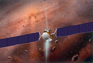 Künstlerische Darstellung der Raumsonde Dawn im Asteroidengürtel
(NASA/JPL)